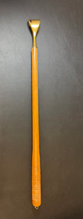 Brass back scratcher with wooded handle