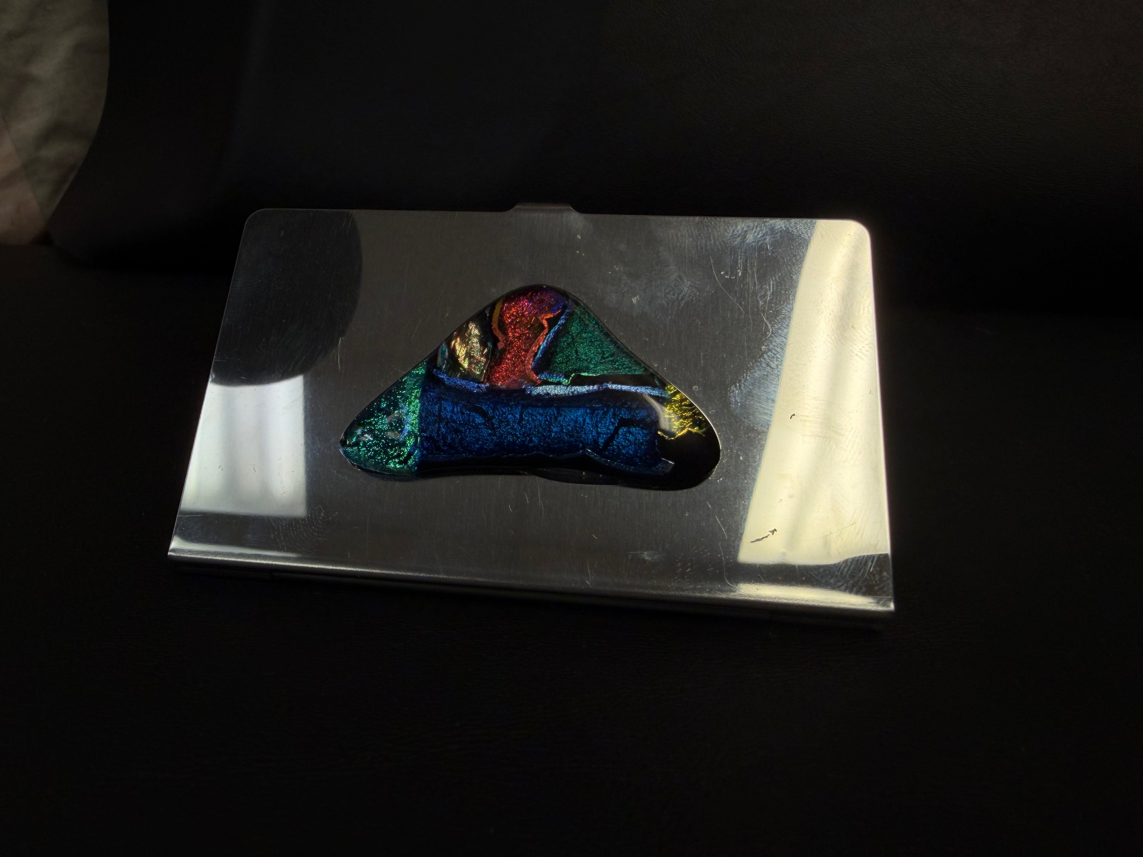 stainless steel business card holder featuring a polished mirror finish